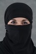 Foto: Eine muslimische Frau im Burka. Kopf Eine muslimische Frau im Burka. Kopf