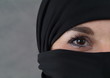 Foto: Eine muslimische Frau im Burka. Auge. Eine muslimische Frau im Burka. Auge.