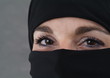 Foto: Eine muslimische Frau mit Burka. Augen. Eine muslimische Frau mit Burka. Augen.