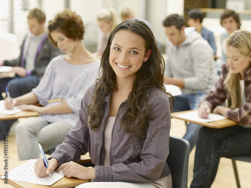 Photo: Smiling college student in classroom Smiling college student in classroom