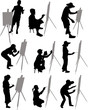 artist paints at easel
