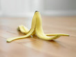 Banana peel on wooden floor