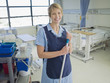 Janitor cleaning hospital room