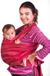 Mother carrying her baby in a sling