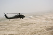 Helicopter flying over Iraqi desert