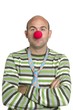 Actor clown posing clown nose and tie