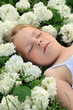 Little girl laying in flowers - snowball