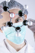 Scientist looking over Atoms
