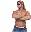 Athletic sexy male body builder with the blonde long hair. gladi