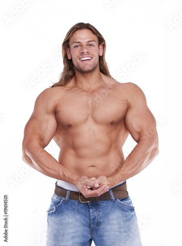 Foto: Athletic sexy male body builder with the blonde long hair. gladi Athletic sexy male body builder with the blonde long hair. gladi
