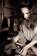 Photo: The fine girl near a wooden case The fine girl near a wooden case