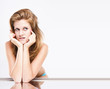 The young funny girl isolated on a white background The young funny girl isolated on a white background