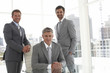 Mature businessman with his team