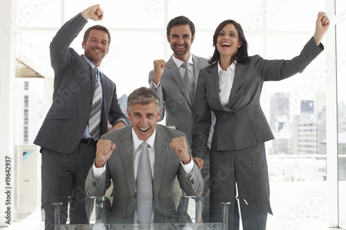 Photo: Motivated business team Motivated business team