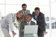 Businessteam with a laptop