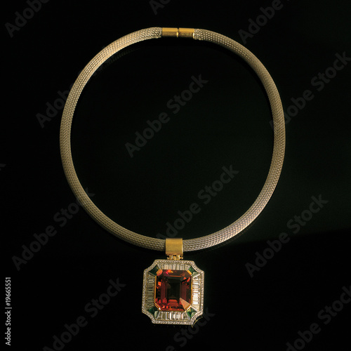 Photo: close up shot of a necklace on black close up shot of a necklace on black