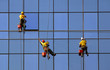 Men washing windows at height