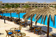 Tables beside the pool in the Egyptian hotel