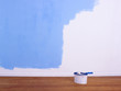 Partially decorated blue wall