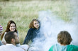 A group of young friends having a barbecue