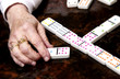 Foto: Woman playing dominoes Woman playing dominoes