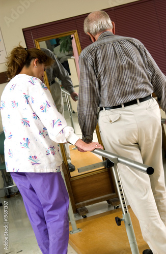 Photo: Man in physical rehabilitation Man in physical rehabilitation