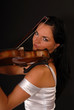 Young beautiful woman with a violin