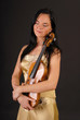 Young beautiful woman with a violin