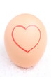 Red heart on egg