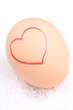 Red heart on egg