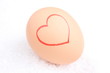 Red heart on egg