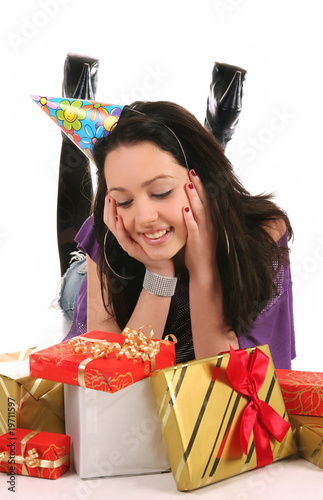 Photo: Beautiful happy girl with a gifts Beautiful happy girl with a gifts