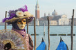 Venice carnival mask posing along St.Mark promenade Venice carnival mask posing along St.Mark promenade