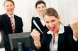 Businesspeople in office having great success