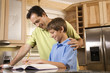 Photo: Father Helping Son with Homework Father Helping Son with Homework