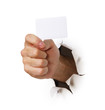 Hand mit Visitenkarte durch Loch in Wand Hand mit Visitenkarte durch Loch in Wand