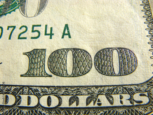 Photo: Hundred dollars macro. Hundred dollars macro.