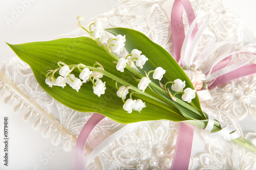 Photo: Lillies on wedding pillow Lillies on wedding pillow