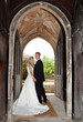 Photo: Wedding couple in church entrance Wedding couple in church entrance