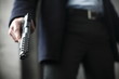 Man holding a .45 caliber gun