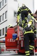 Photo: Feuerwehrmänner in Aktion Feuerwehrmänner in Aktion