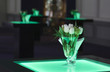 Hotel ballroom with luminous bar tables