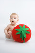 Infant and strawberry.