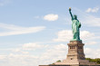 Statue of liberty against blue New York sky Statue of liberty against blue New York sky