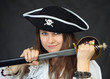 Portrait of woman - pirate getting sabre from a sheath