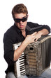 Male with accordion and gun