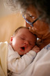 Photo: Grandma kissing baby Grandma kissing baby