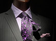 Striped jacket with purple shirt, patterned tie and handkerchief