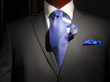 Striped jacket with blue striped tie and handkerchief