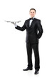 Young person in a suit holding an empty tray